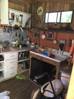 63236325 Ridgeview Road Knoxville, TN 37918 - Photo 10 of 13 a kitchen with a stove and a table