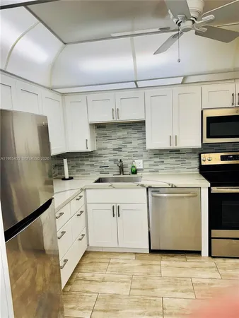 $1,800 | 2601 South Course Drive, Unit 409, Pompano Beach, FL 33069