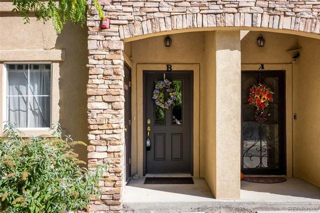 a front view of a house with a porch