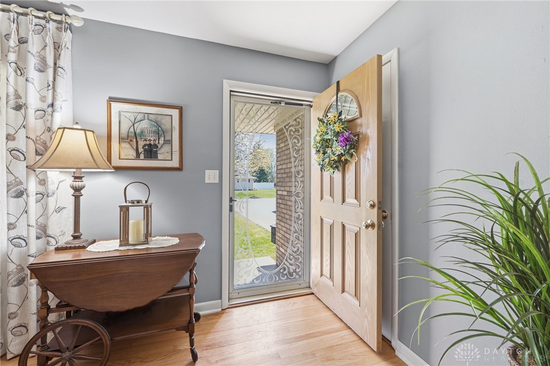 2945 Ashlar Drive Springfield, OH 45503 - Photo 3 of 20 This inviting entryway features warm wood flooring and a welcoming open door.