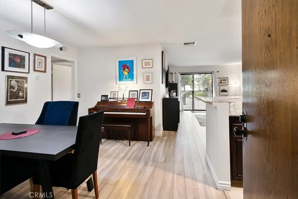 a bed room with a bed and a television
