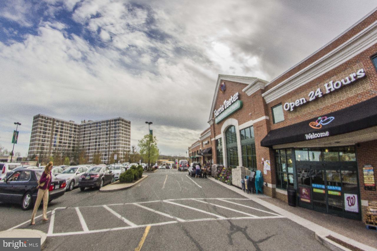 4600 Duke Street, Unit 620 Alexandria, VA 22304 - Photo 37 of 40 a view of a building with car parked