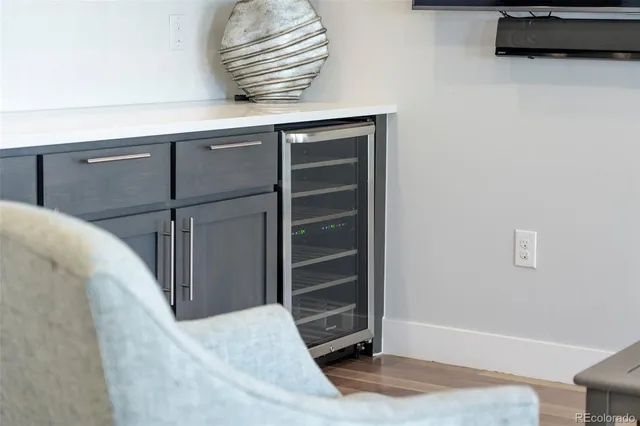 a view of bedroom with furniture and wooden floor
