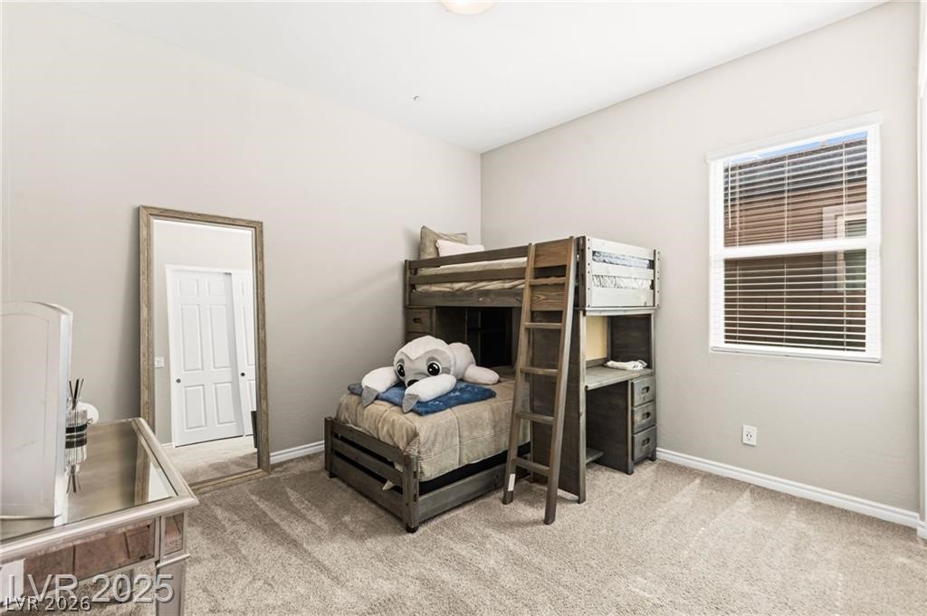 103 Reflection Cove Drive Henderson, NV 89011 - Photo 50 of 66 Bedroom with light carpet