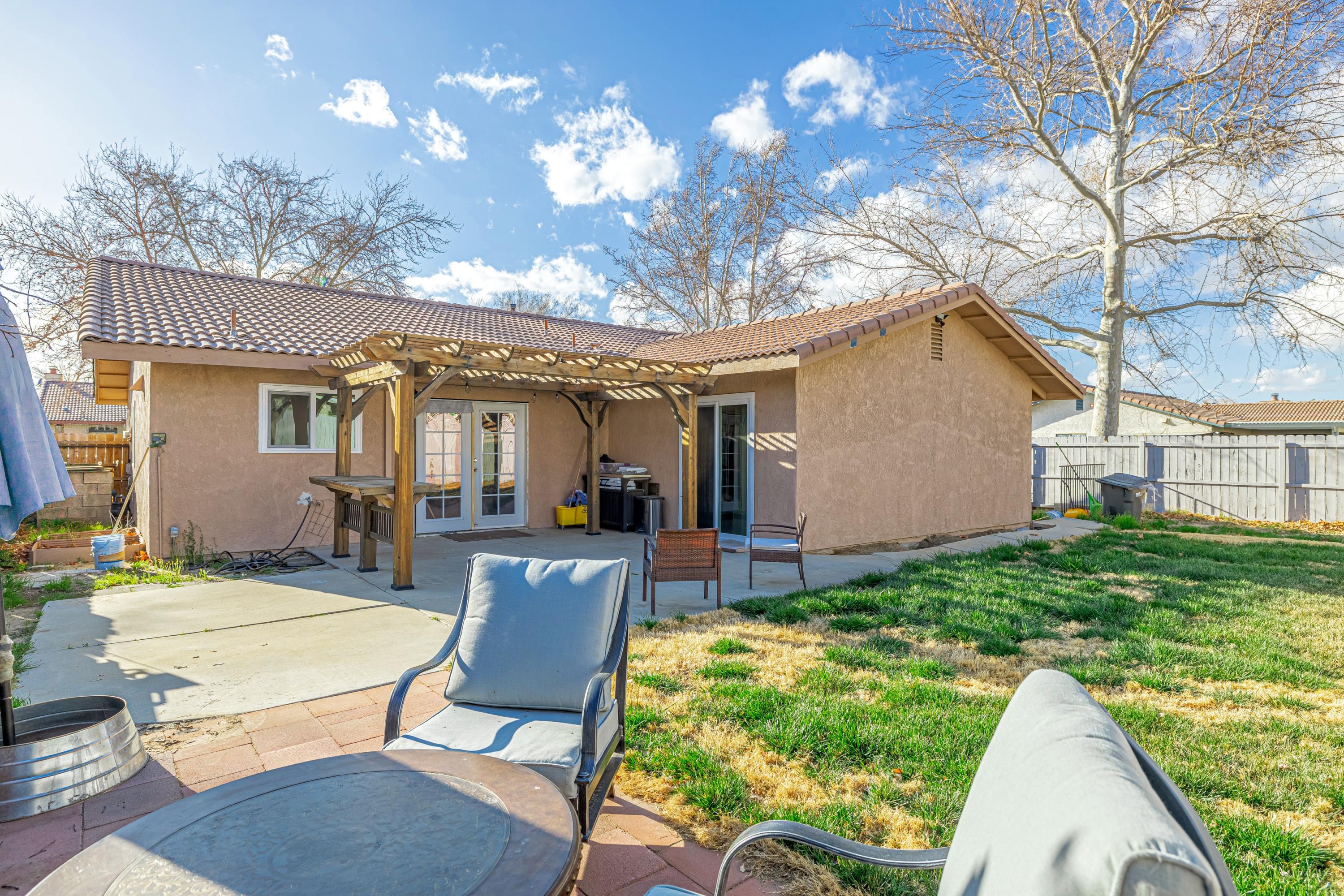 43652 Santa Rosa Circle Lancaster, CA 93535 - Photo 22 of 25 a view of a house with backyard and sitting area