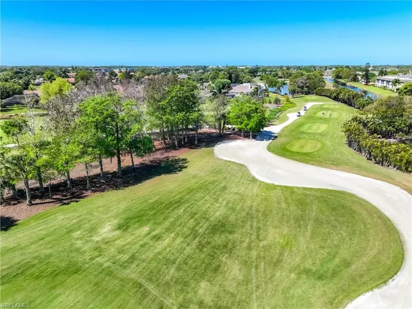 a view of a swimming pool from a outdoor space