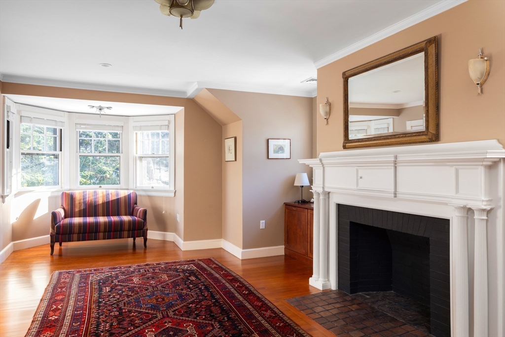 40 Heath Hill Brookline, MA 02445 - Photo 22 of 40 a living room with furniture and a fireplace