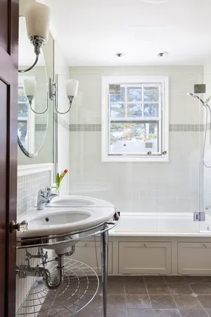 a bedroom with a bed and with chair