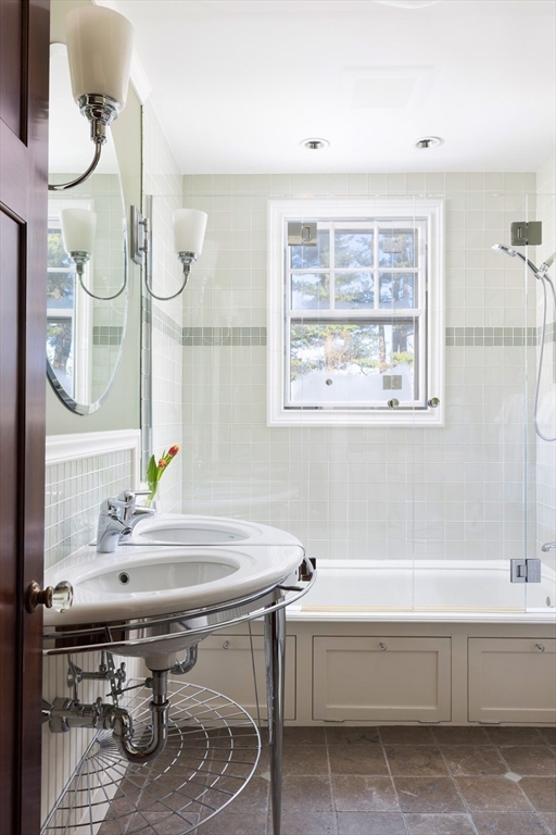 40 Heath Hill Brookline, MA 02445 - Photo 25 of 40 a bathroom with a sink and a bathtub