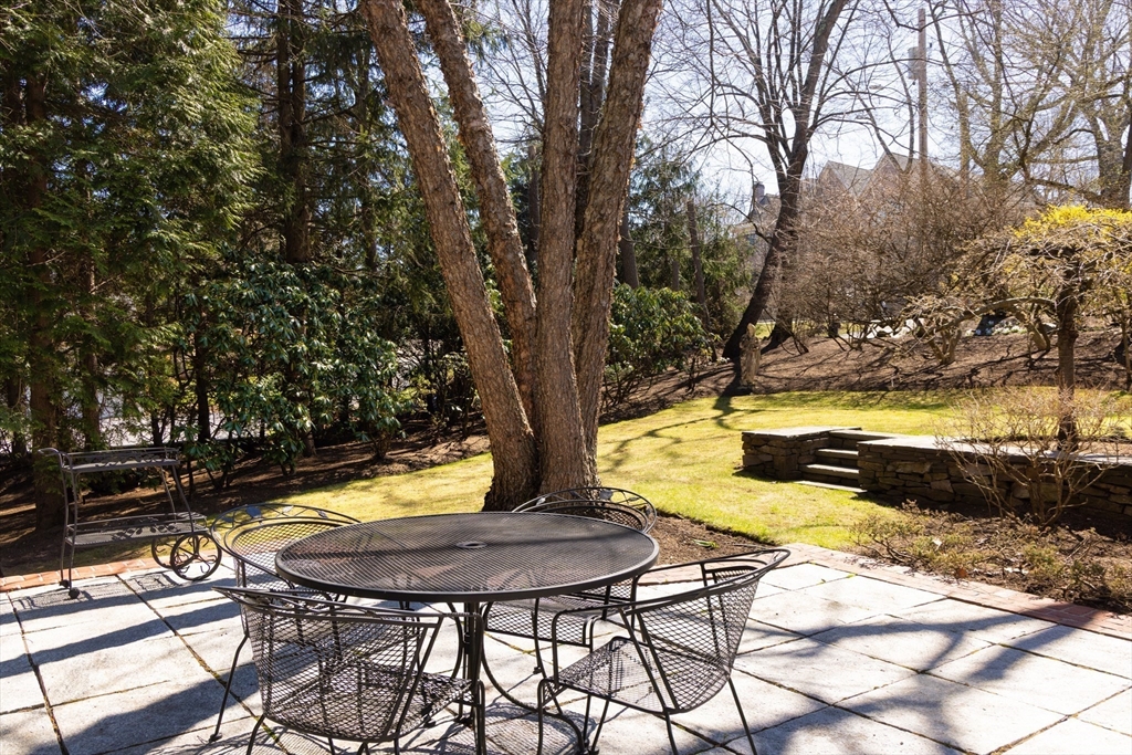 40 Heath Hill Brookline, MA 02445 - Photo 35 of 40 a view of swimming pool with a table and chairs