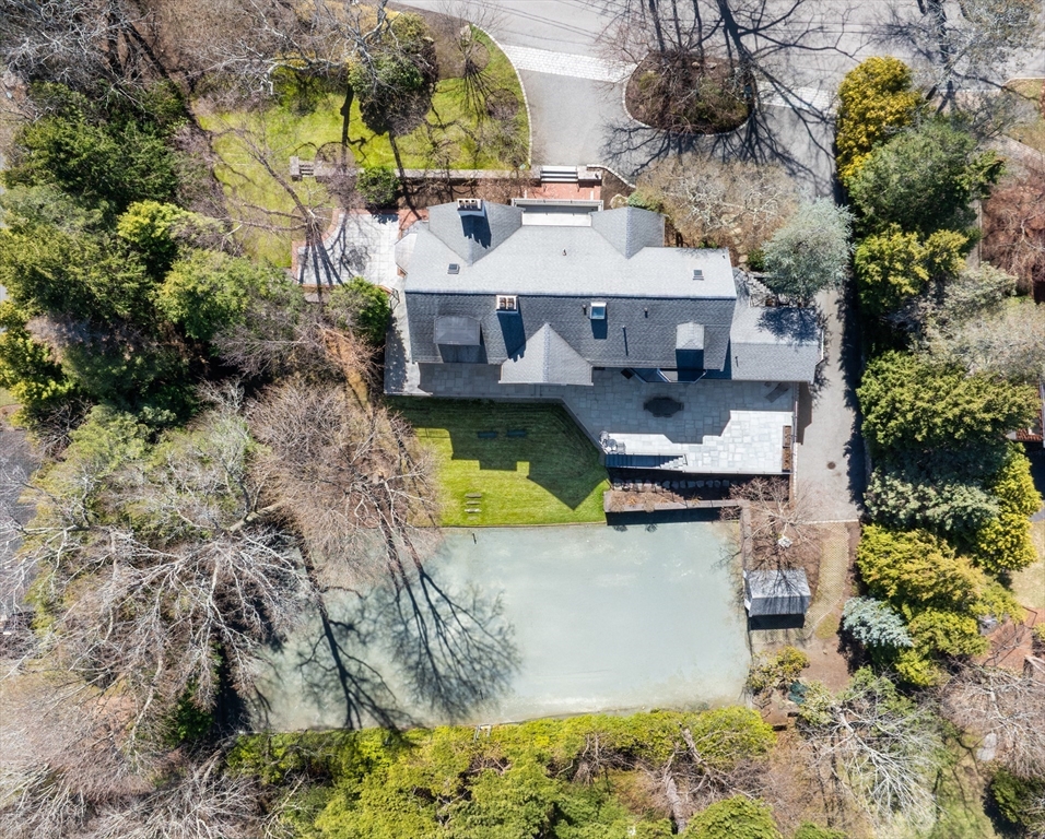 40 Heath Hill Brookline, MA 02445 - Photo 39 of 40 a view of a house with a yard and a large pool
