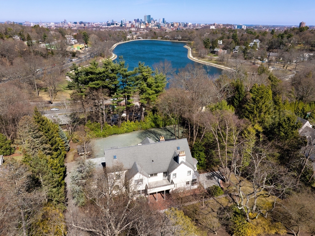 40 Heath Hill Brookline, MA 02445 - Photo 40 of 40 an aerial view of a house with a yard and lake view