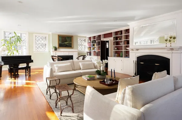 a bedroom with a bed and a fireplace