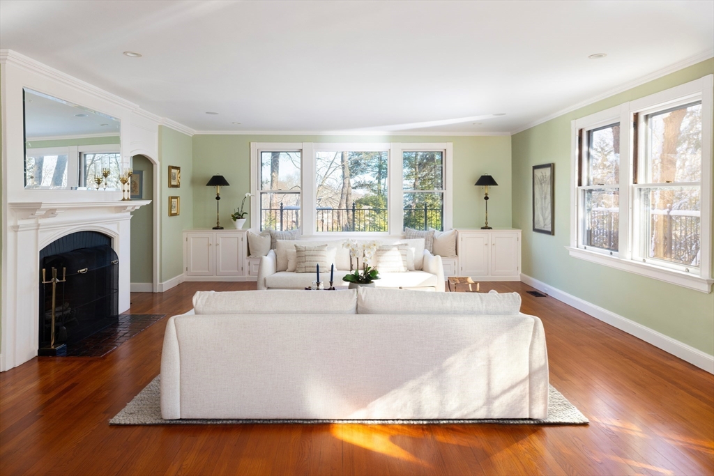 40 Heath Hill Brookline, MA 02445 - Photo 6 of 40 a living room with fireplace furniture and a large window