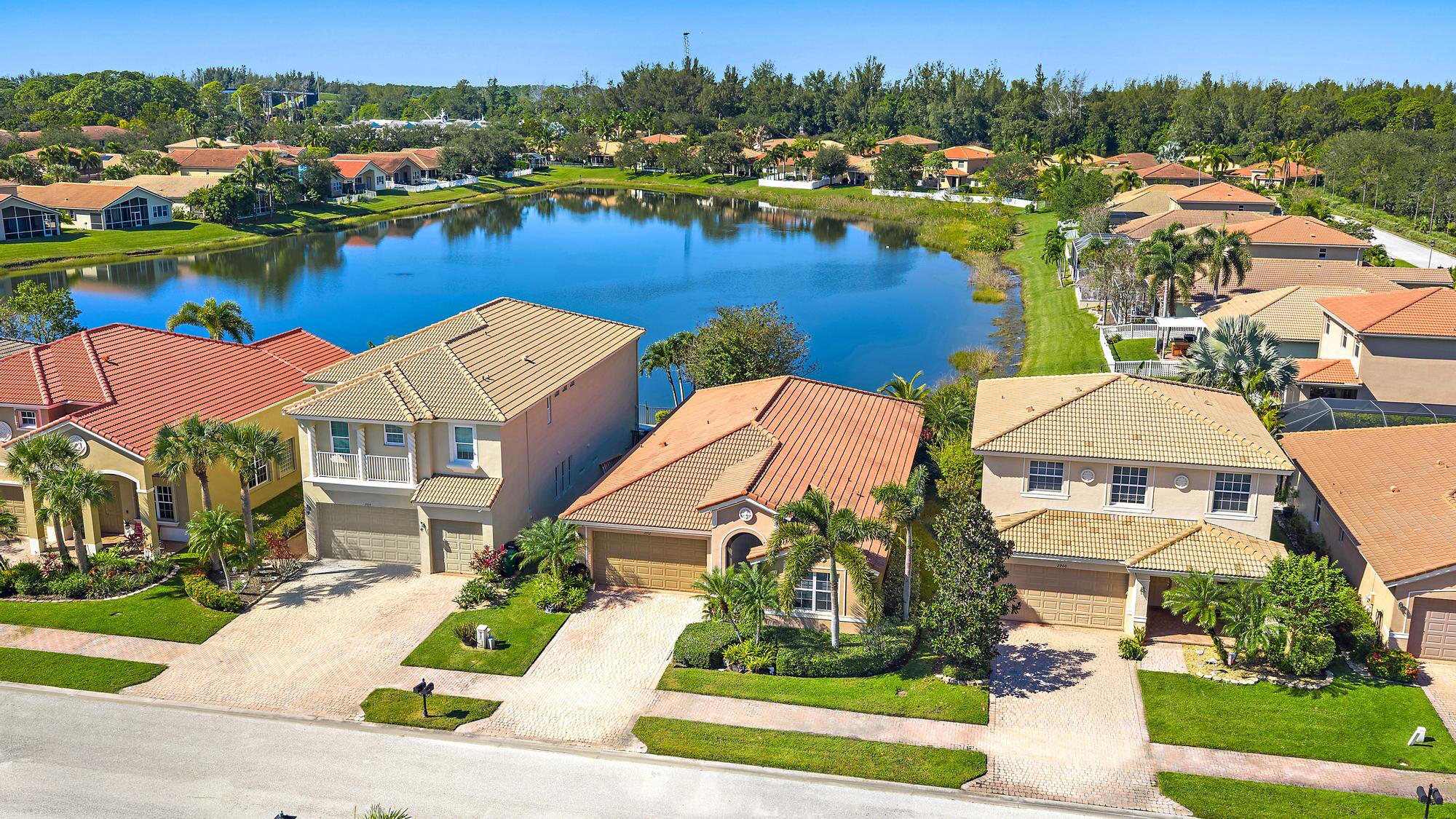 2912 Southwest Porpoise Circle Stuart, FL 34997 - Photo 20 of 36 an aerial view of residential houses with outdoor space and river