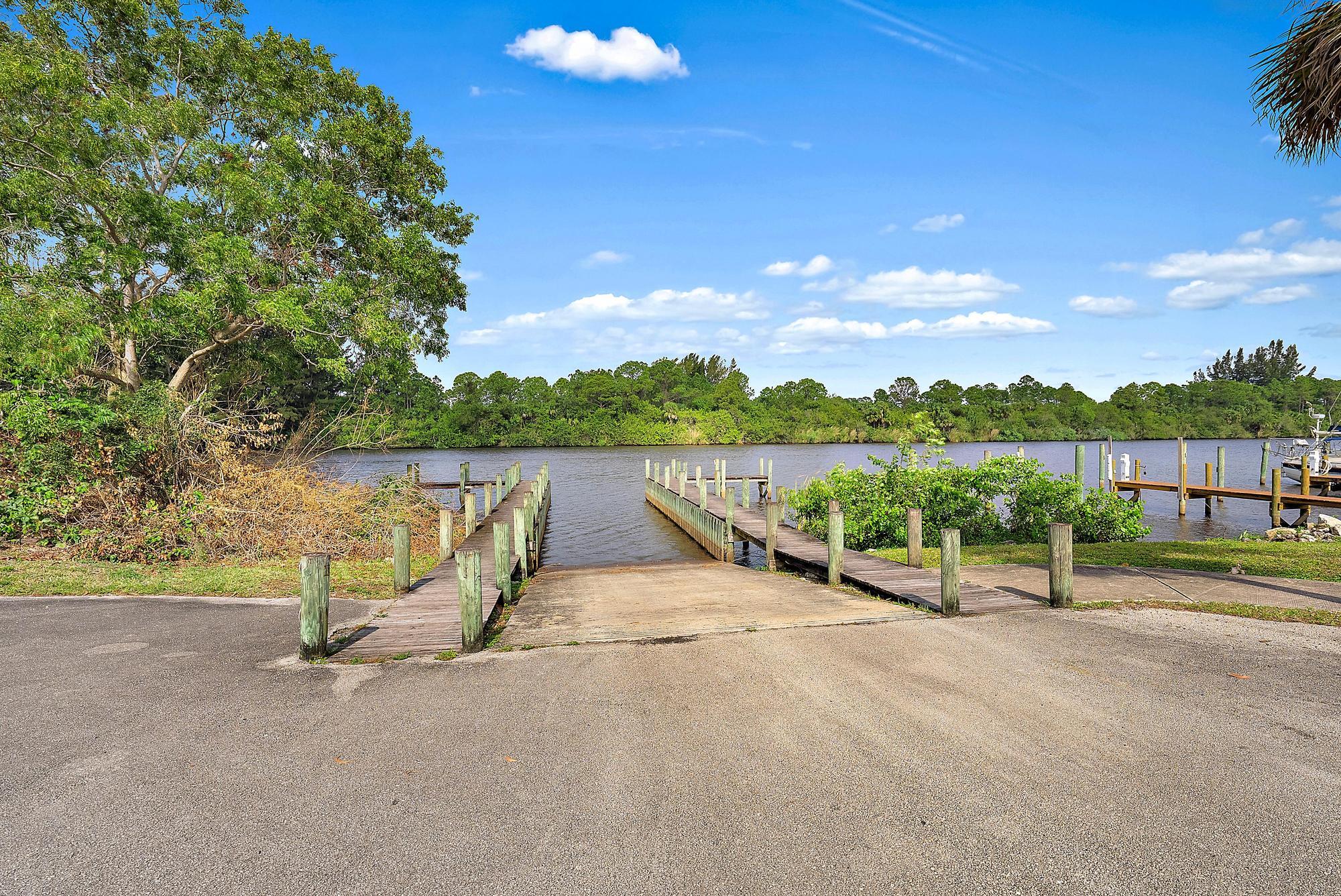 2912 Southwest Porpoise Circle Stuart, FL 34997 - Photo 34 of 36 a view of outdoor space with porch