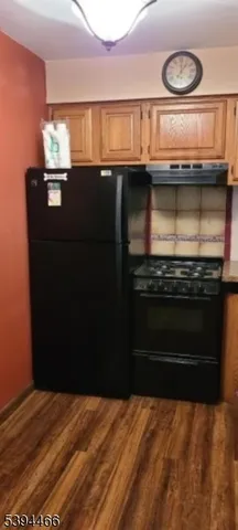 a kitchen with a stove and a microwave