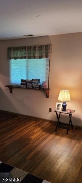 8 Steamboat Drive, Unit 11 Vernon, NJ 07462 - Photo 5 of 8 a living room with furniture and a wooden floor