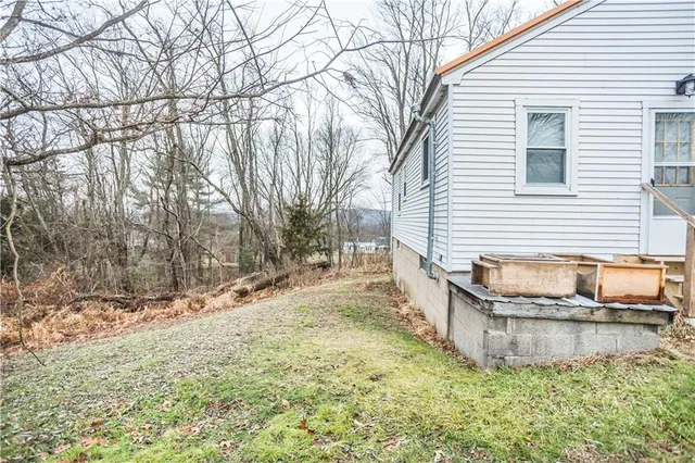 a bathroom with a sink and a yard