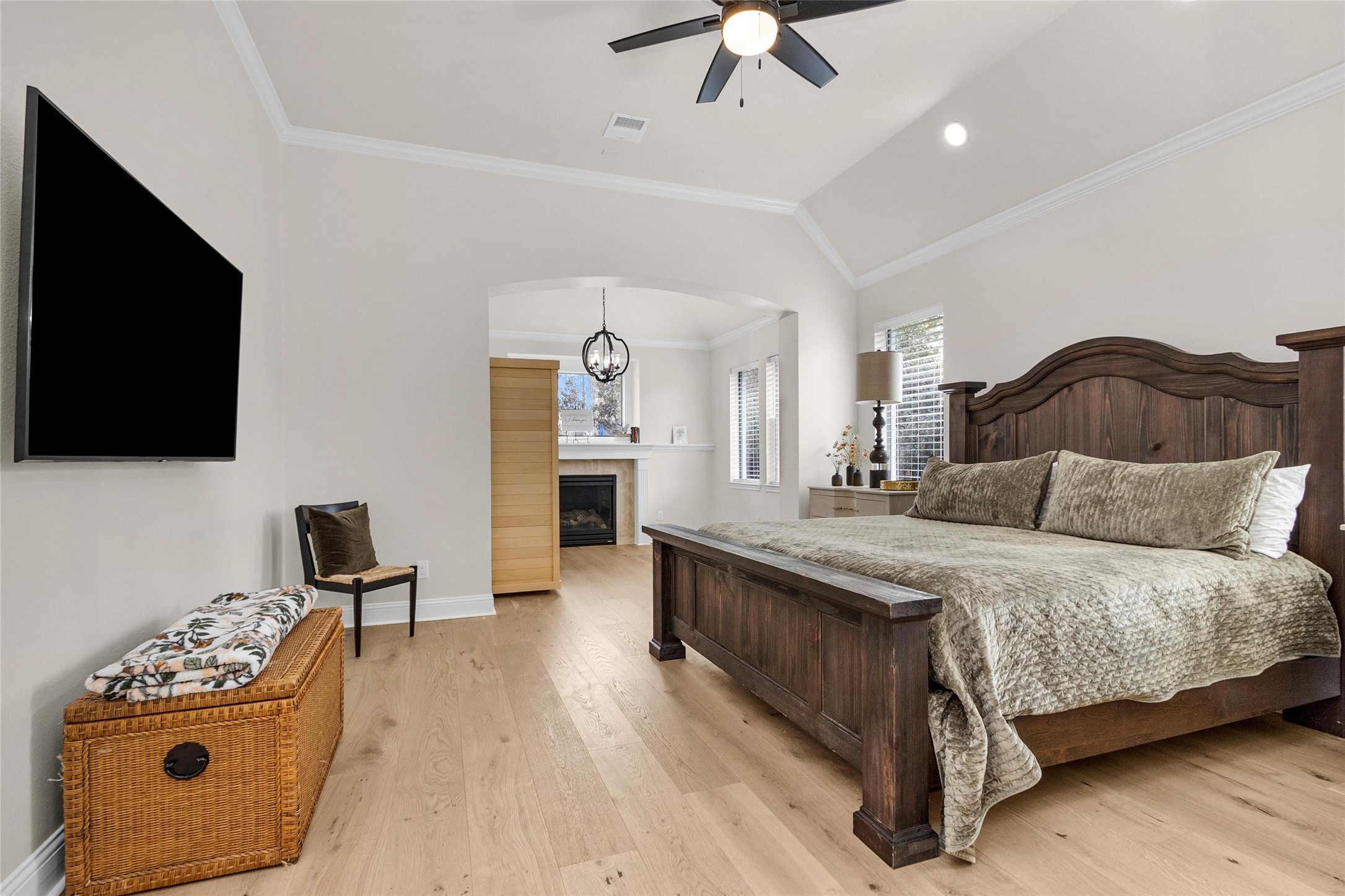 10004 Summer Ridge Lane Conroe, TX 77302 - Photo 25 of 50 a bedroom with a bed and a flat screen tv