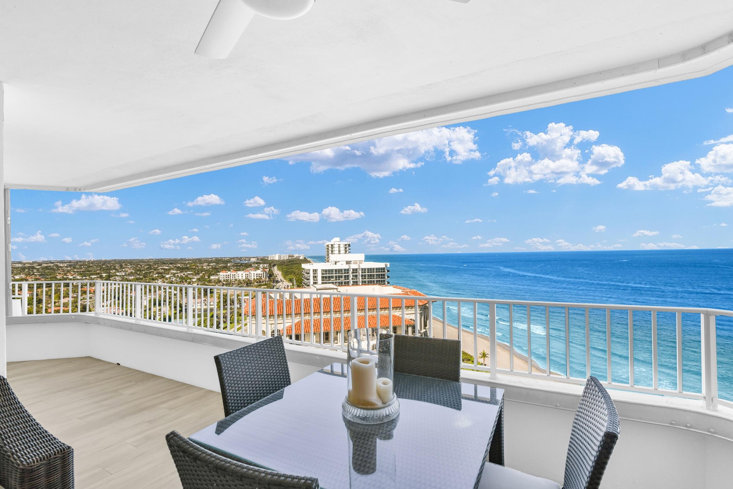 500 South Ocean Boulevard, Unit 1807 Boca Raton, FL 33432 - Photo 2 of 53 a view of a dining room with furniture a chandelier and wooden floor