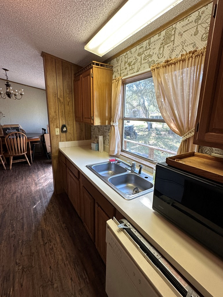 0 Ranch Road 1723 Mason, TX 76856 - Photo 30 of 50 a kitchen with kitchen island a large window a sink and appliances