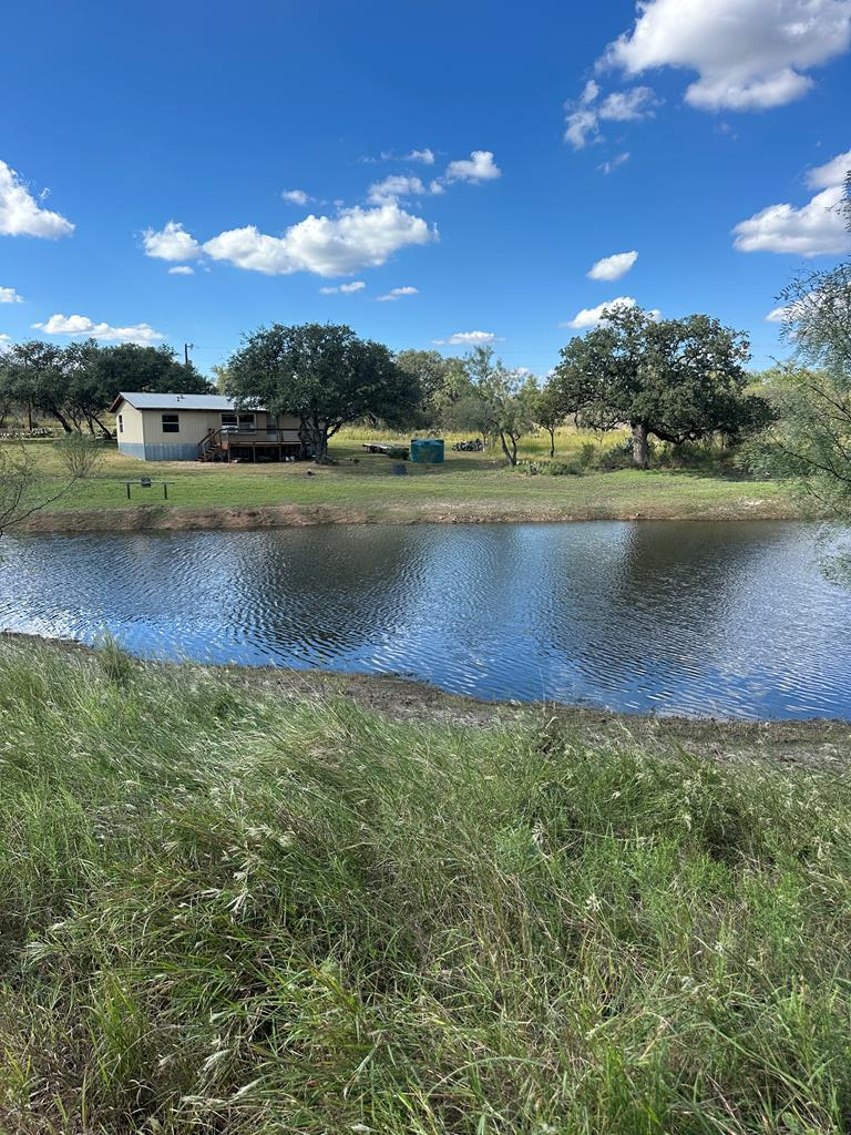 0 Ranch Road 1723 Mason, TX 76856 - Photo 42 of 50 a view of a lake in between two of the house