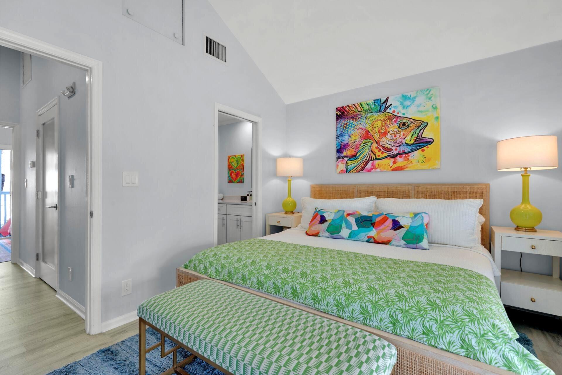 528 Porter Lane Key West, FL 33040 - Photo 11 of 27 a bedroom with a bed and wooden floor