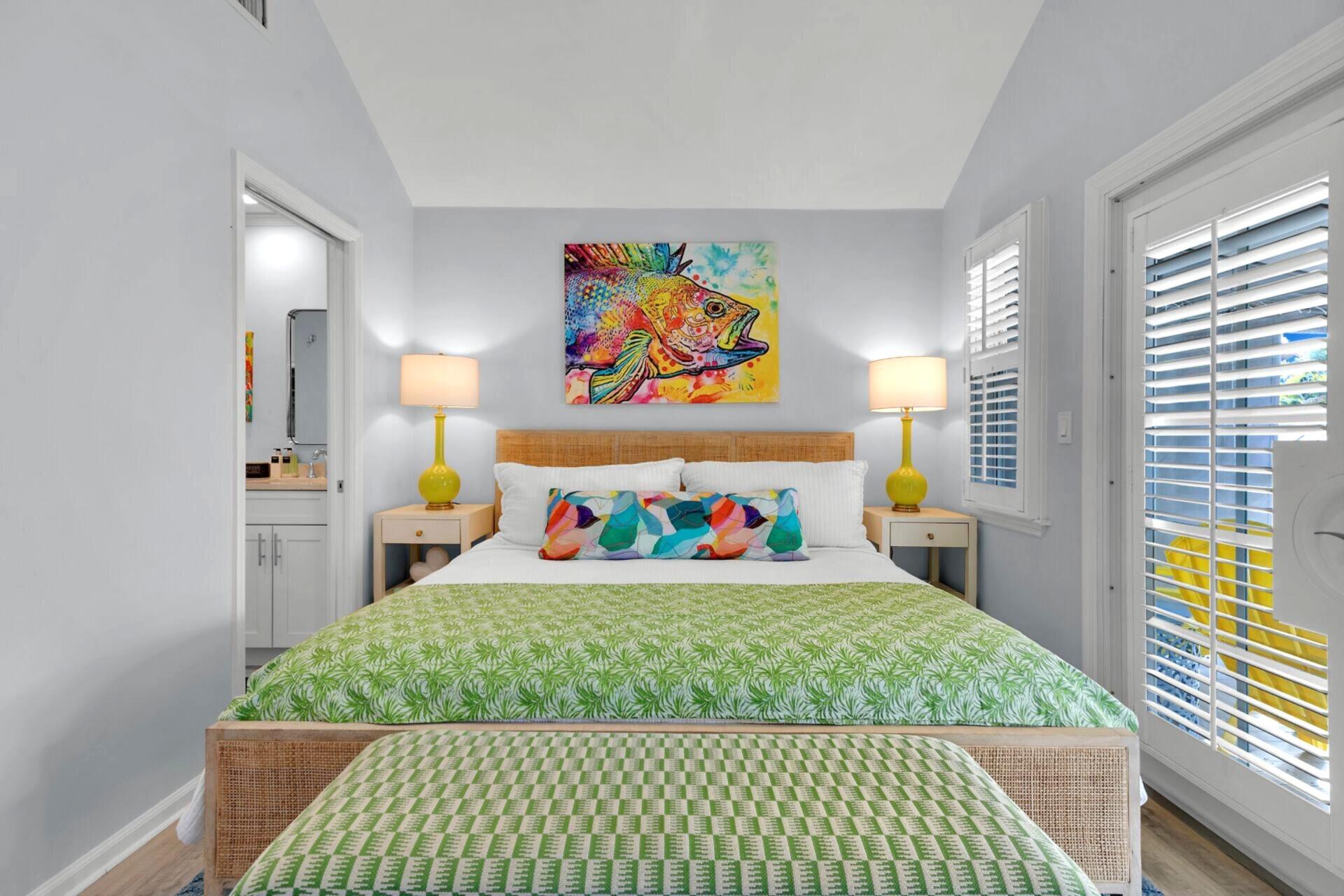 528 Porter Lane Key West, FL 33040 - Photo 12 of 27 a bedroom with a bed and a painting on the wall