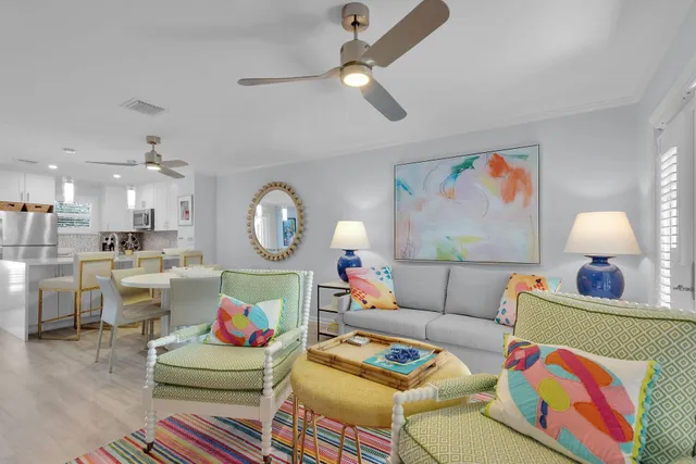 a living room with furniture and a table