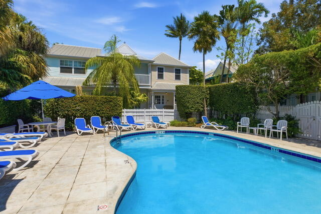 528 Porter Lane Key West, FL 33040 - Photo 26 of 27 a view of a house with swimming pool and sitting area