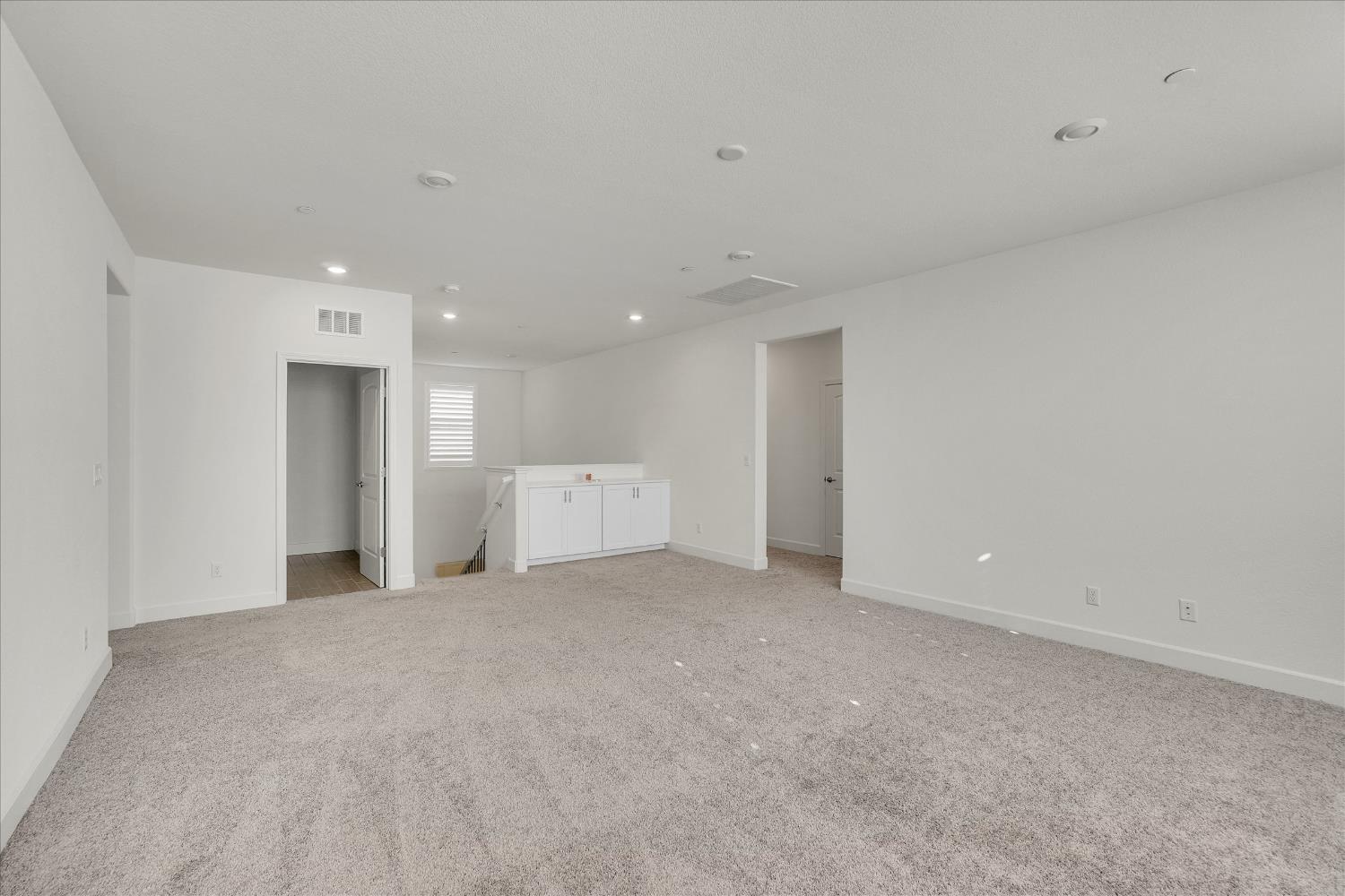 5280 Fandango Loop Roseville, CA 95747 - Photo 16 of 53 Another angle of the bonus room with furthest door to the laundry room