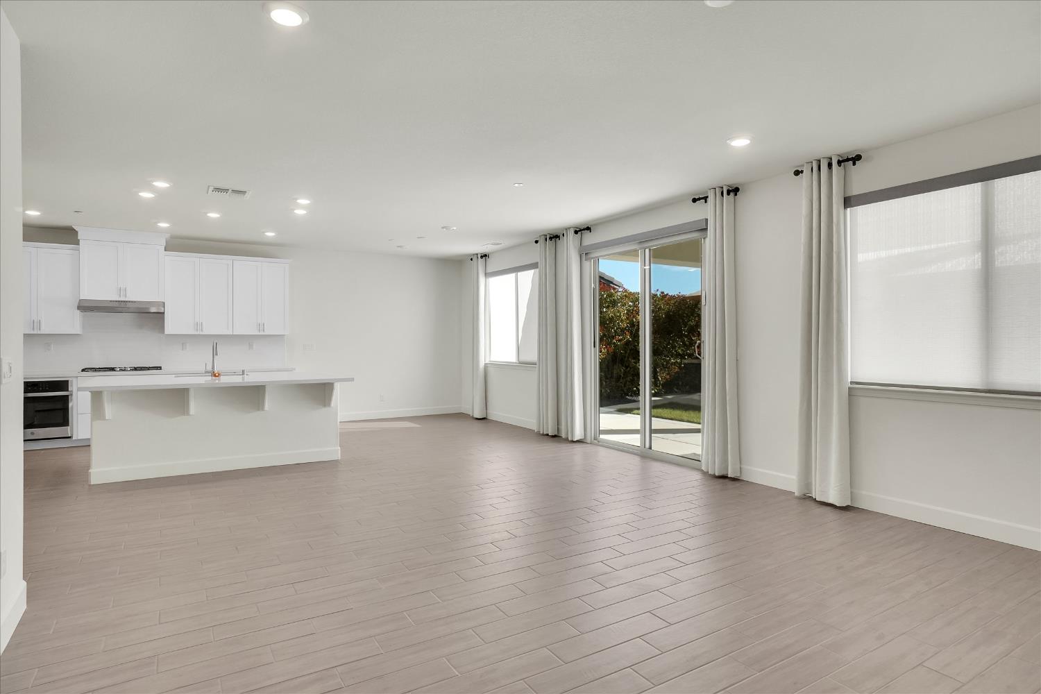 5280 Fandango Loop Roseville, CA 95747 - Photo 5 of 53 Spacious eating area. Lots of light, professional window curtains and shades.