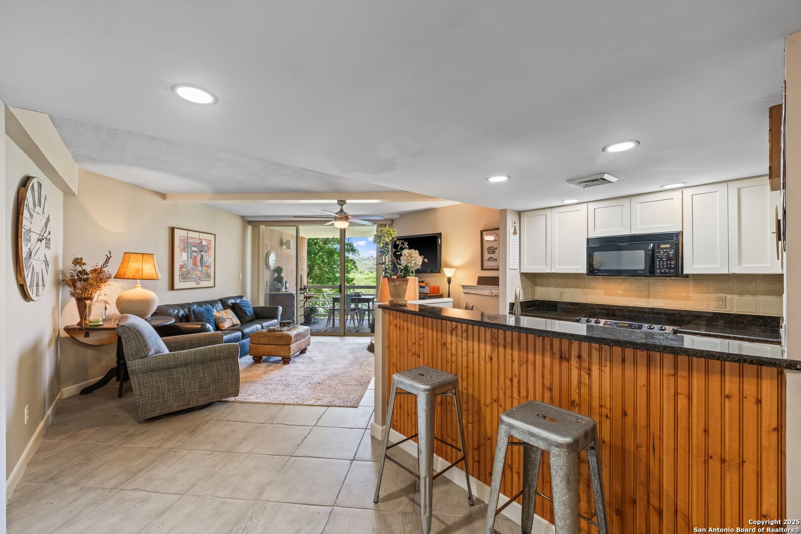 1000 Guadalupe Street, Unit 3B G1 Kerrville, TX 78028 - Photo 12 of 39 a living room with furniture and a wooden floor
