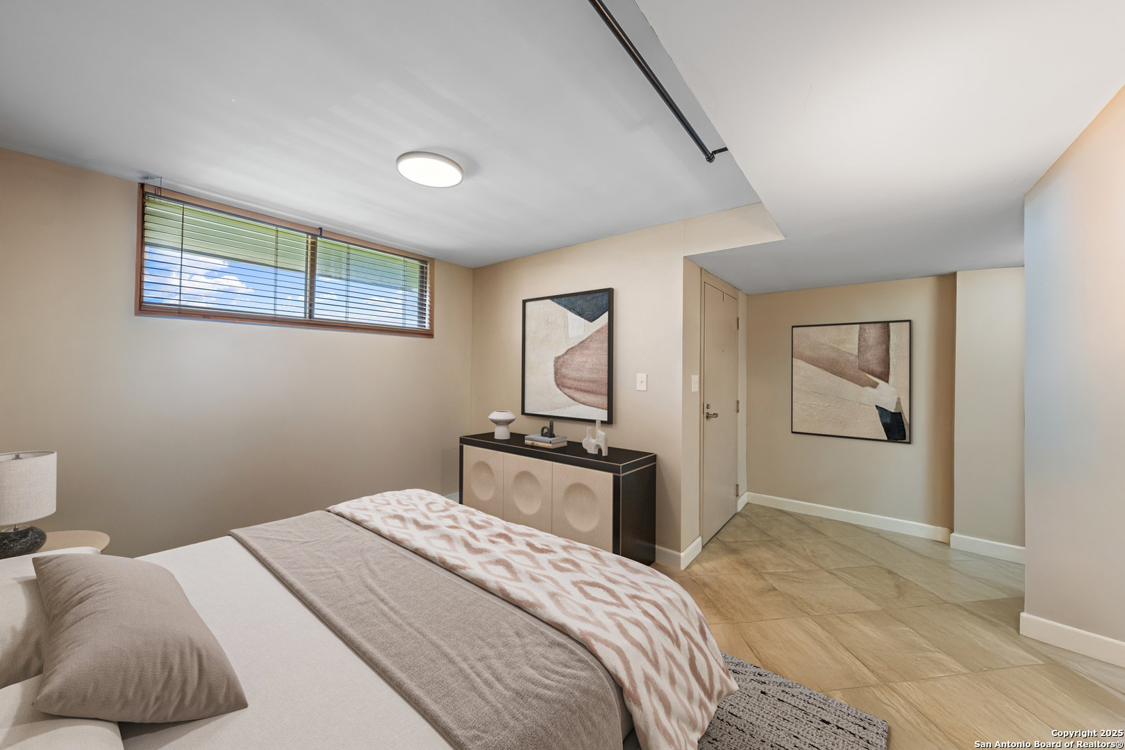 1000 Guadalupe Street, Unit 3B G1 Kerrville, TX 78028 - Photo 13 of 39 a bedroom with a bed and dresser