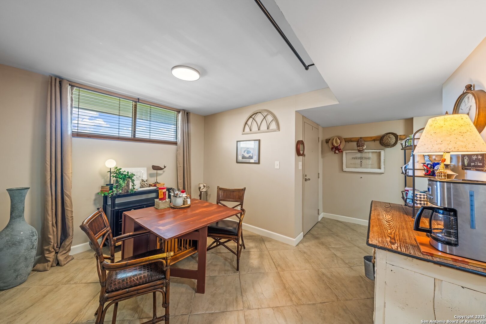 1000 Guadalupe Street, Unit 3B G1 Kerrville, TX 78028 - Photo 14 of 39 a view of a dining room with furniture and a window
