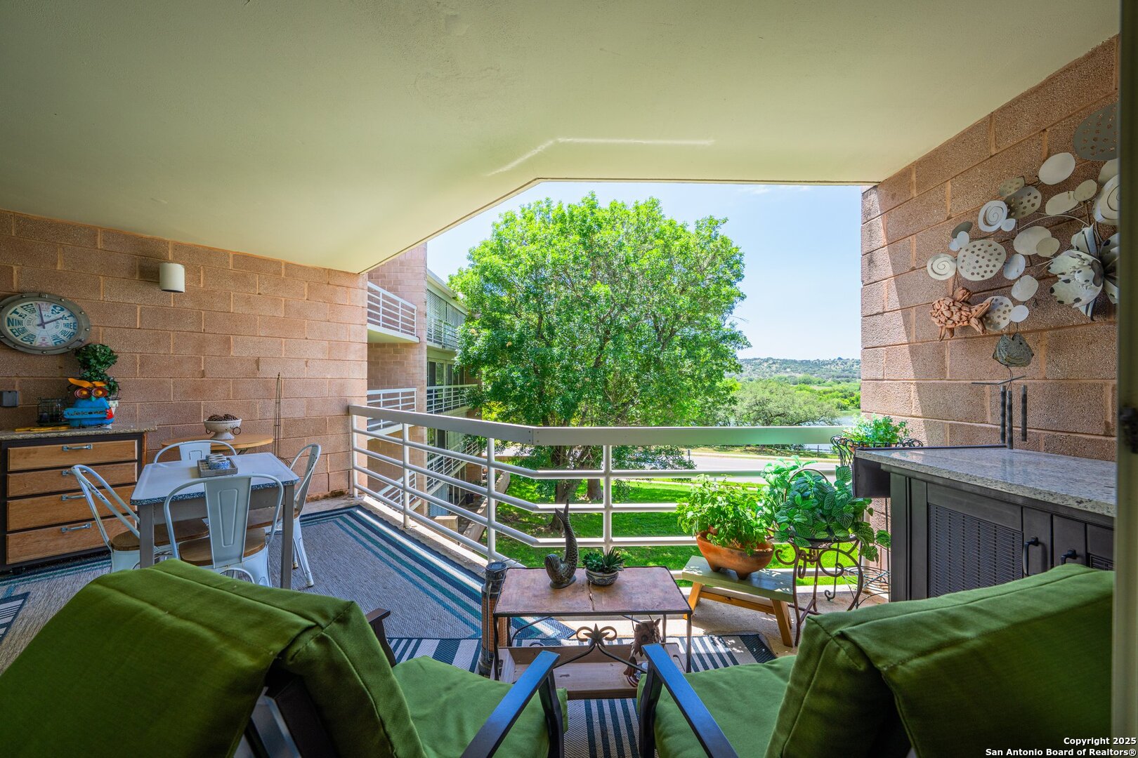 1000 Guadalupe Street, Unit 3B G1 Kerrville, TX 78028 - Photo 19 of 39 a view of a chairs and table in patio