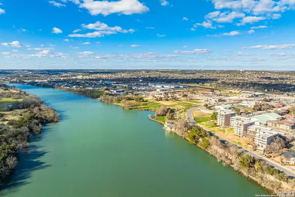 a view of an ocean and city
