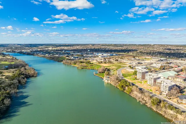 a view of an ocean and city