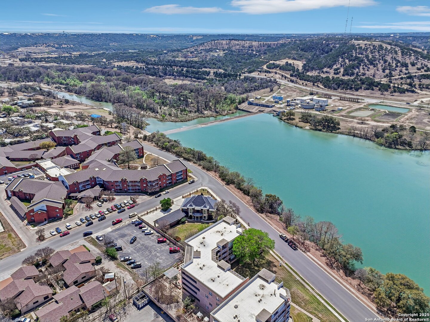 1000 Guadalupe Street, Unit 3B G1 Kerrville, TX 78028 - Photo 34 of 39 an aerial view of a house with a lake view