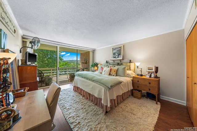 a bed room with a bed and a table