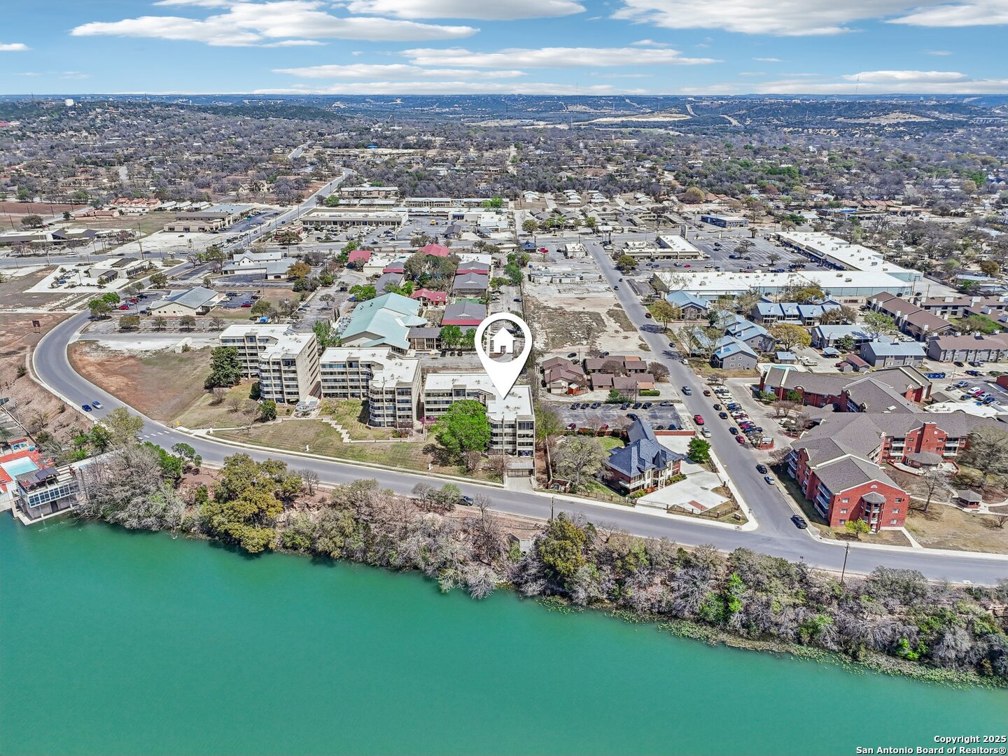 1000 Guadalupe Street, Unit 3B G1 Kerrville, TX 78028 - Photo 9 of 39 an aerial view of a house with outdoor space
