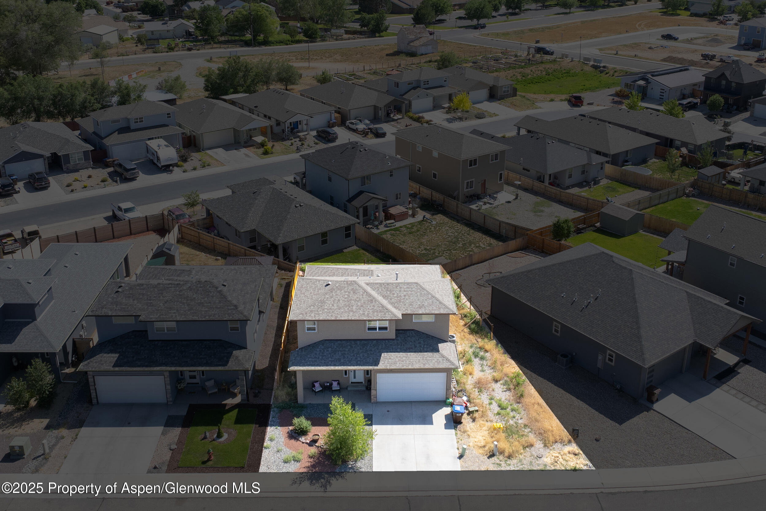 1149 East 17th Street Rifle, CO 81650 - Photo 15 of 16 an aerial view of residential houses with outdoor space