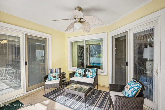 a outdoor space with patio lots of furniture and white umbrella