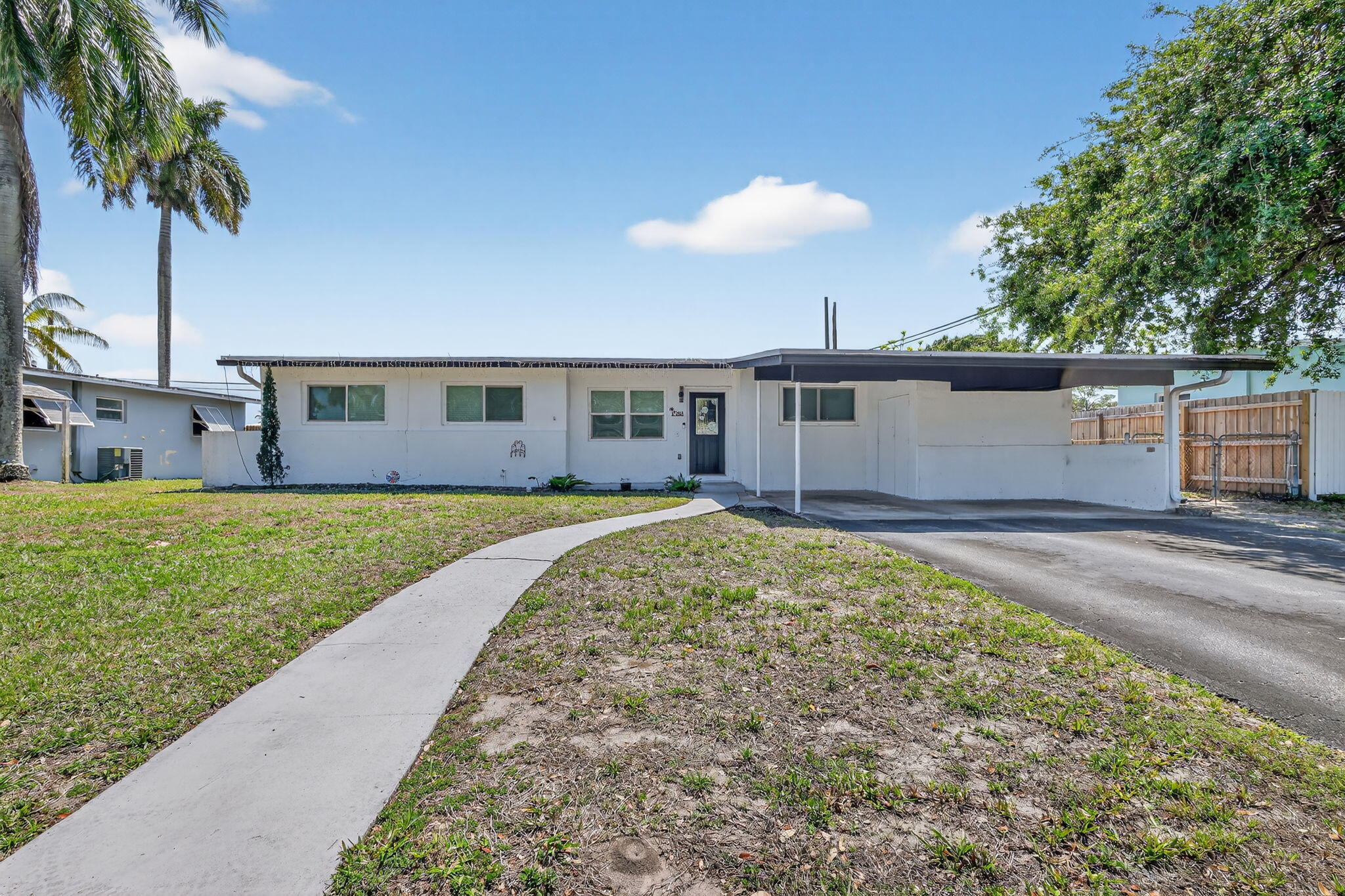 353 Shady Lane Road Palm Springs, FL 33461 - Photo 1 of 41 2-web-or-mls-F14A4366