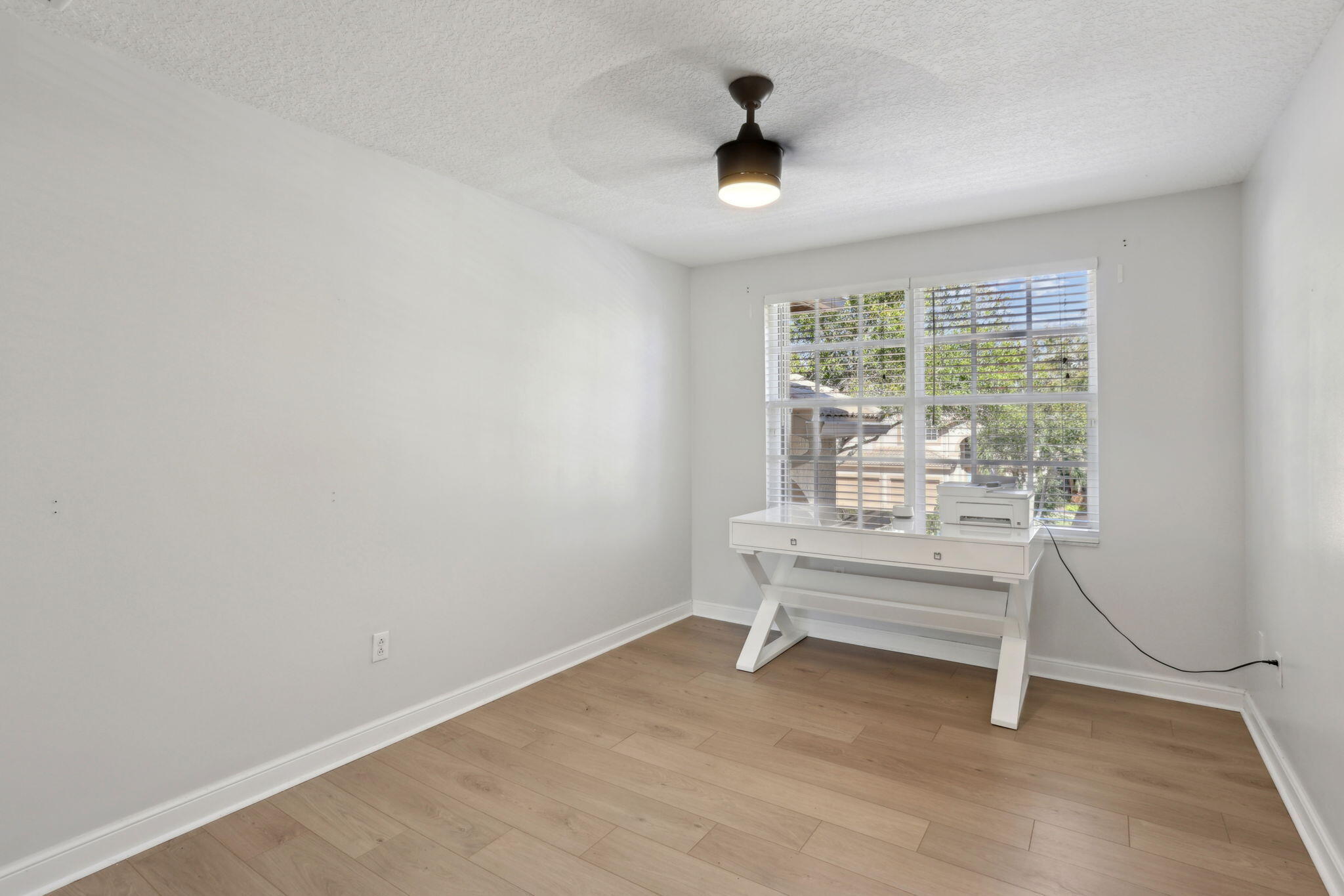 4816 South Classical Boulevard Delray Beach, FL 33445 - Photo 37 of 44 a view of workspace with a window