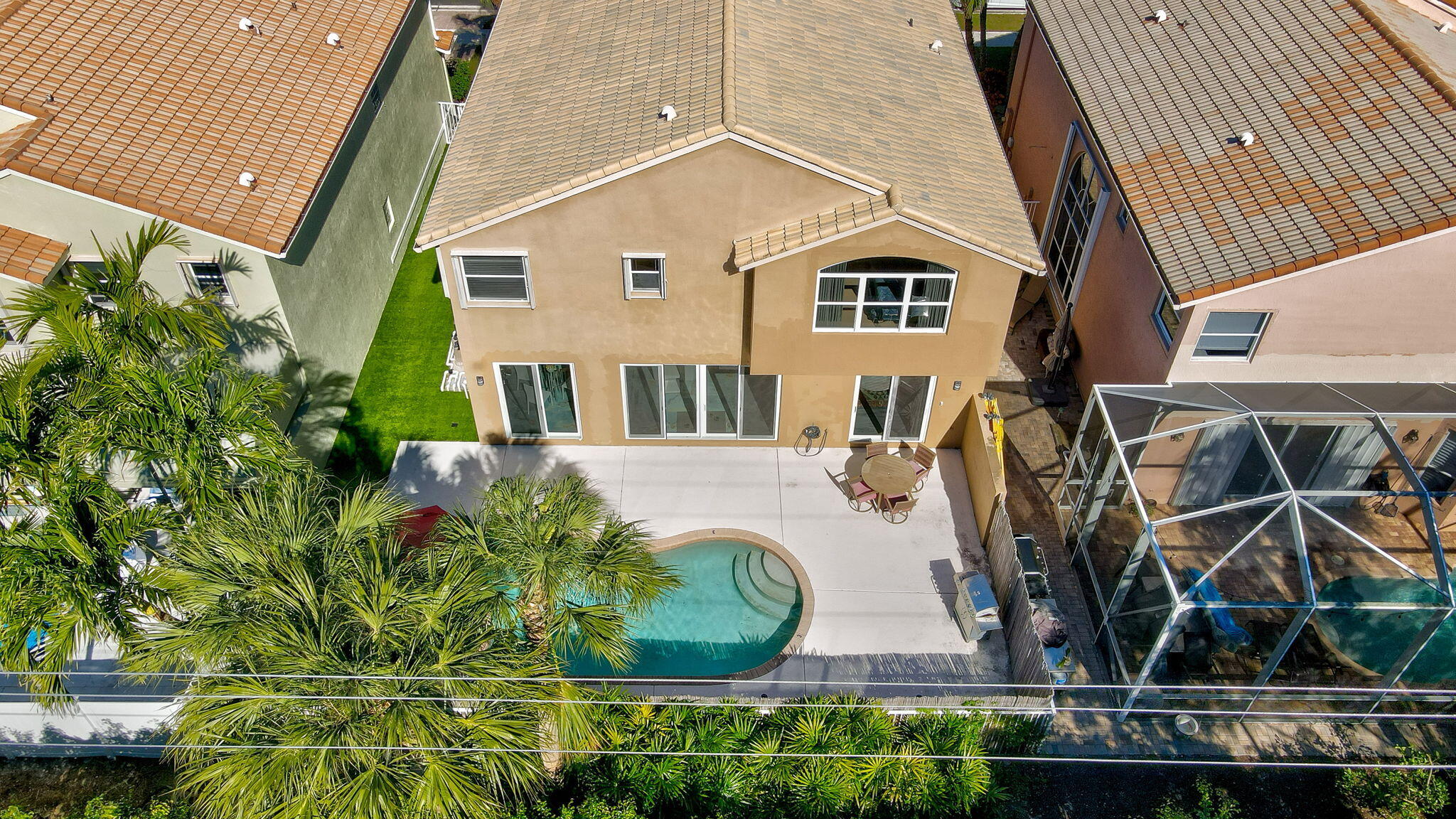 4816 South Classical Boulevard Delray Beach, FL 33445 - Photo 43 of 44 a front view of a house with garden