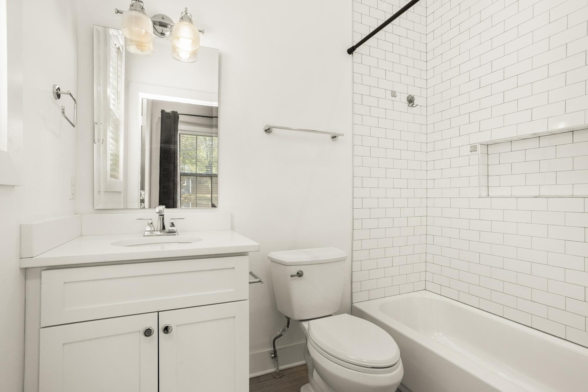942 Riverside Drive Nashville, TN 37206 - Photo 14 of 33 a bathroom with a sink a toilet and shower