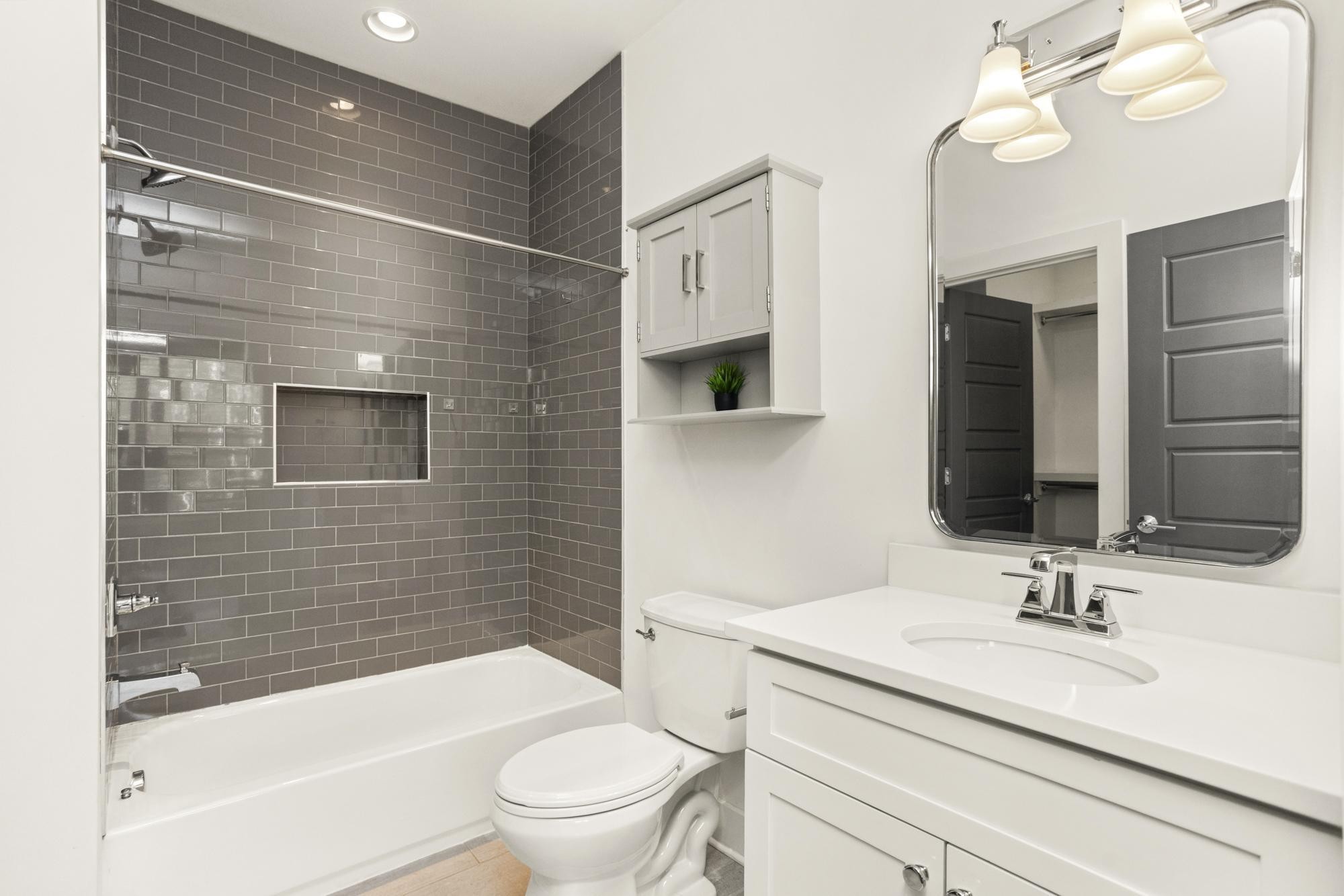 942 Riverside Drive Nashville, TN 37206 - Photo 19 of 33 a bathroom with a sink a toilet and shower