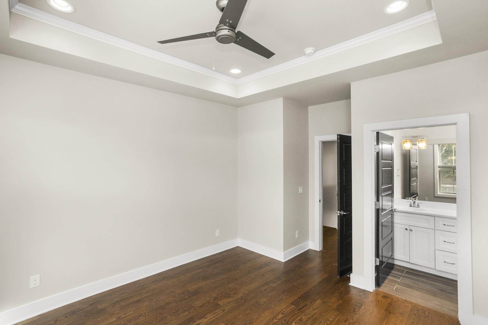 942 Riverside Drive Nashville, TN 37206 - Photo 24 of 33 an empty room with wooden floor and windows